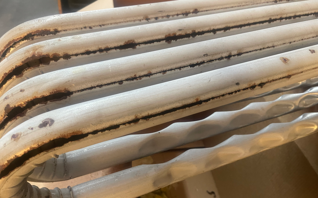 A picture of a rusted heat exchanger